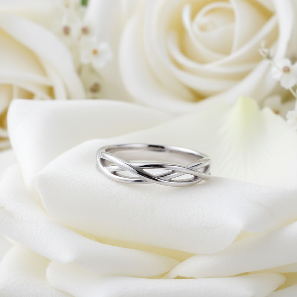 Luxury wedding ring on rose petal
